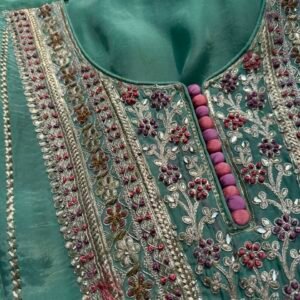Pastel Turquoise unstitched suit with playful multicolour