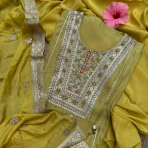 Soft olive green unstitched suit with playful multicolour