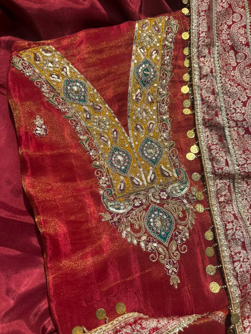 Maroon unstitched shimmer tissue suit with colourful embroidery paired with Banarsi dupatta - Image 2