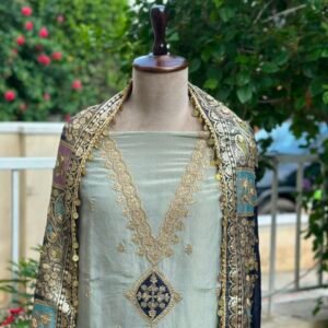 Powder Blue silk tissue unstitched suit with zari embroidery paired with Banarsi dupatta